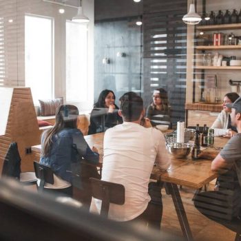 A group of colleagues gathered at the office
