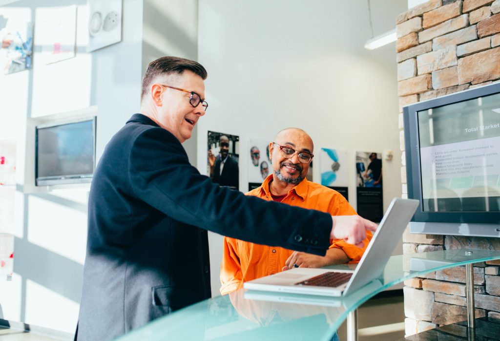 Employee working with their manager to improve company culture