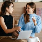 Two colleagues talking at the office