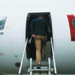 A person boarding on a plane