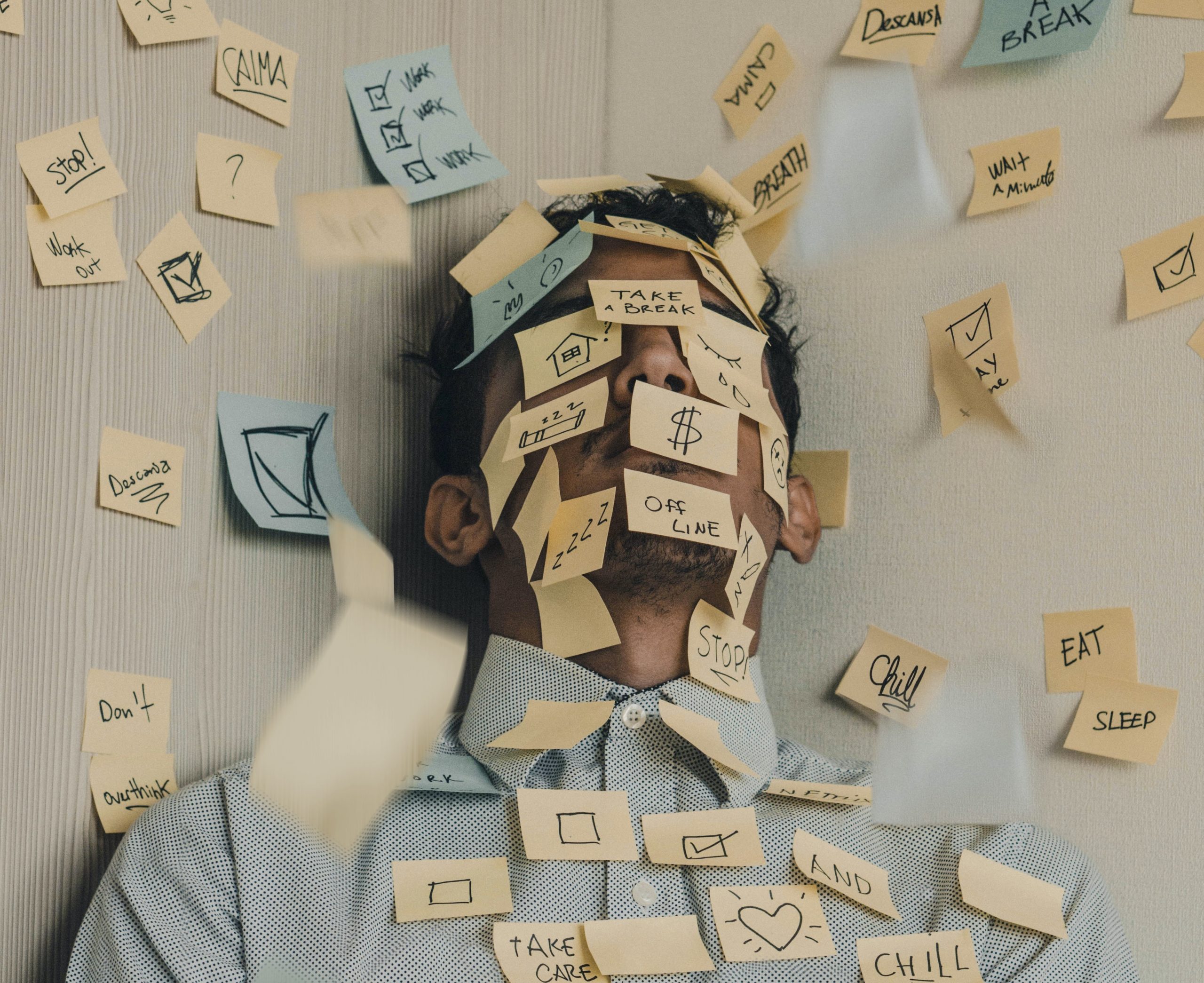 overwhelmed worker showing signs of burnout