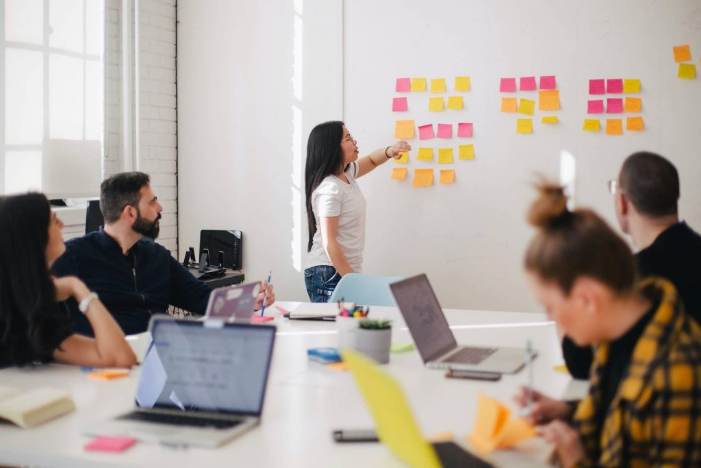 A scrum meeting with people defining the recruiting process