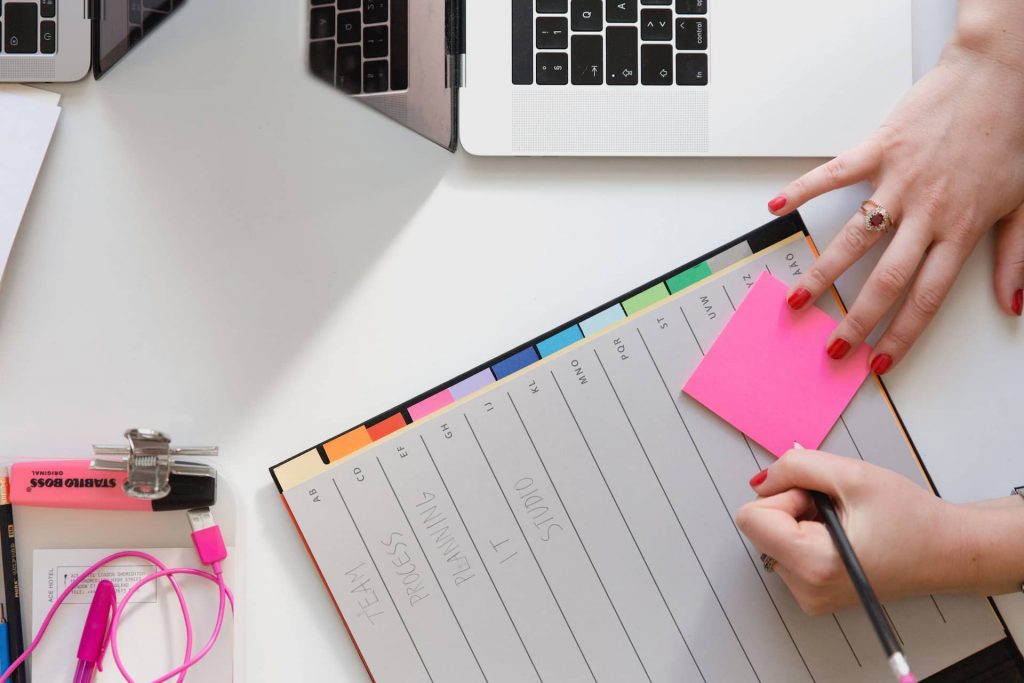 An employee working on their career development plan on an agenda