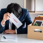 An employee at his desk exemplifying employee turnover